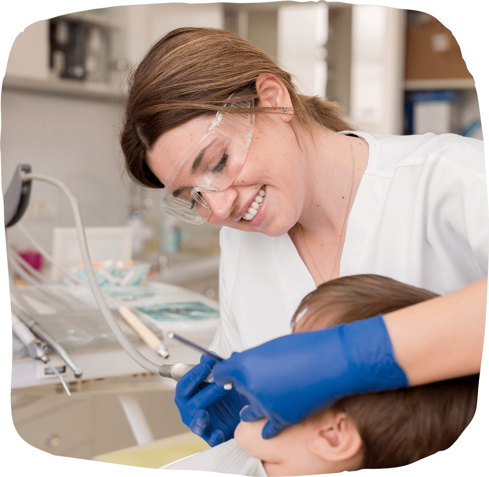 dentist-cleaning-child-s-teeth-min